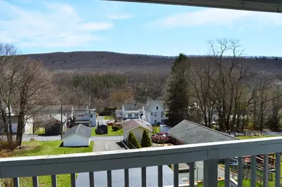 a view from the balcony of a house at Mountain View Suites in Jim Thorpe