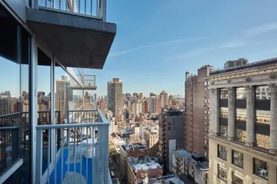 a view of the city from a building at Hotel Park Ave NYC in New York