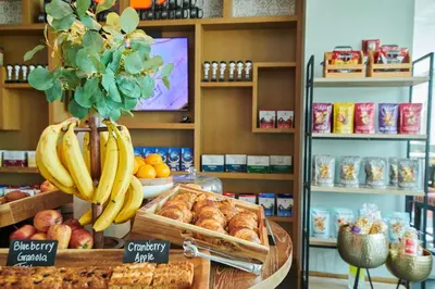 a store with a bunch of bread and bananas on display at Hilton Philadelphia at Penn's Landing in Philadelphia