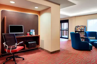 an office with a desk and chairs and a computer at TownePlace Suites by Marriott Harrisburg Hershey in Harrisburg