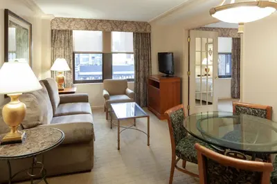 a living room with a couch and a table at The Manhattan Club in New York