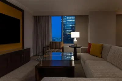 a living room with a couch and a television at Philadelphia Marriott Downtown in Philadelphia