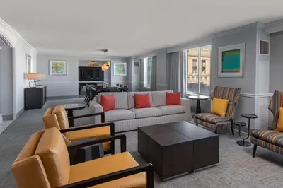a living room with a couch and chairs at Philadelphia Marriott Downtown in Philadelphia