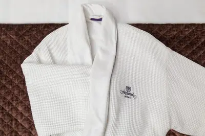 a white jacket with a sticker on the side of it at Fitzpatrick Manhattan in New York