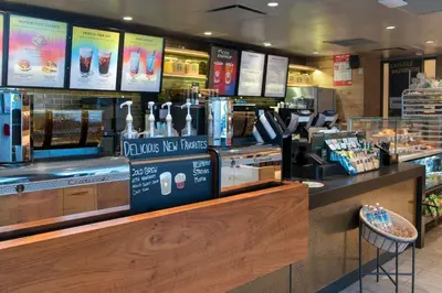 a fast food restaurant with a counter with a counter sidx sidx at New York Marriott Downtown in New York
