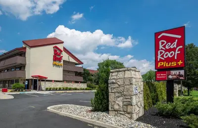 a red roof pub sign in front of a building at Red Roof Inn PLUS+ Secaucus - Meadowlands in Secaucus