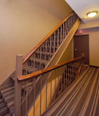 a staircase in a building with a stair case at Hotel Five44 in New York
