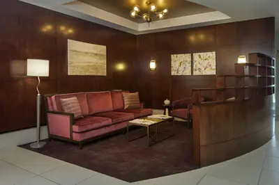 a living room with a couch and a table at SpringHill Suites by Marriott Philadelphia Airport / Ridley Park in Ridley Park