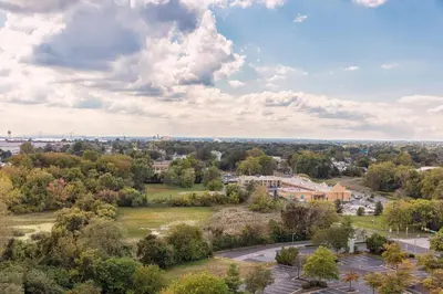 an aerial view of a park with trees and buildings at Delta Hotels by Marriott Philadelphia Airport in Philadelphia