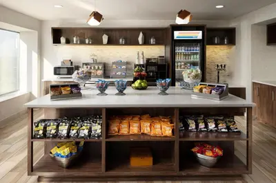 a counter in a store with food and drinks at Delta Hotels by Marriott Philadelphia Airport in Philadelphia