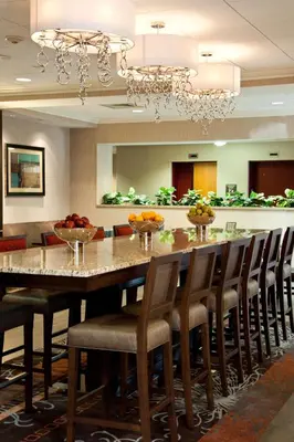 a large dining room with a large table and chairs at Hampton Inn Doylestown in Warrington