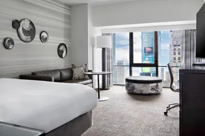 a living room with a couch and a table at New York Marriott Marquis in New York