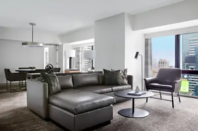 a living room with a couch and a table at New York Marriott Marquis in New York