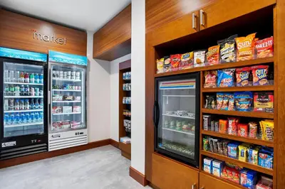 a store aisle with food and drinks at Residence Inn by Marriott Wilmington Downtown in Wilmington