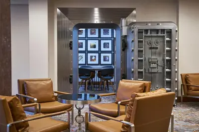 a waiting room with chairs and a table at Residence Inn by Marriott Wilmington Downtown in Wilmington