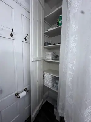 a walk in closet with a roll of toilet paper at Susquehanna Manor Inn in Marietta