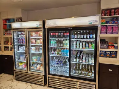 two refrigerators with drinks in them in a store at Homewood Suites By Hilton Allentown Bethlehem Center Valley in Center Valley