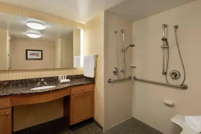 a bathroom with a sink and a shower at Homewood Suites by Hilton Allentown-West/Fogelsville in Fogelsville