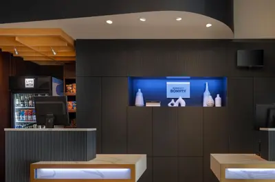 a restaurant with a tv on the wall at Courtyard by Marriott New York Manhattan / Soho in New York
