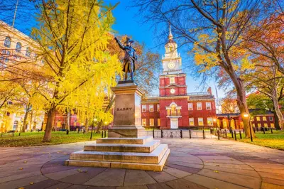 a statue in front of a building with a clock tower at Courtyard by Marriott Philadelphia Downtown in Philadelphia
