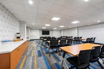 a conference room with tables and chairs in it at Hampton Inn Bordentown in Bordentown