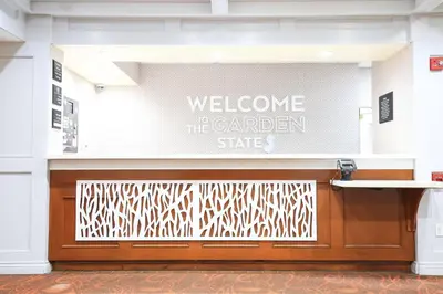 a welcome to the garden state sign on a building at Hampton Inn Bordentown in Bordentown