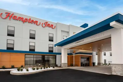 a hilton hampton inn sign on the front of a building at Hampton Inn Bloomsburg in Bloomsburg