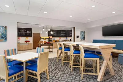 a conference room with a table and chairs at Hampton Inn Bloomsburg in Bloomsburg