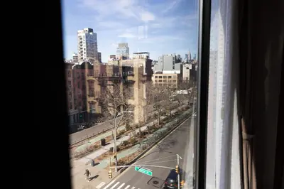 a view of a city from a window at The Allen Hotel in New York