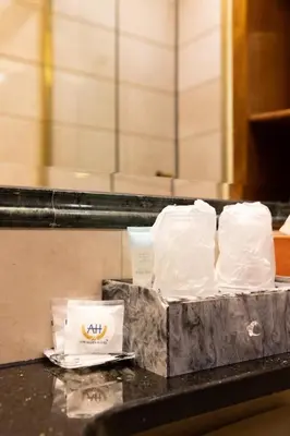 a counter with two bags of food on it at The Allen Hotel in New York