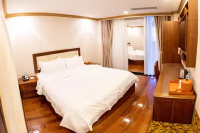 a bedroom with a large white bed in a room at The Allen Hotel in New York