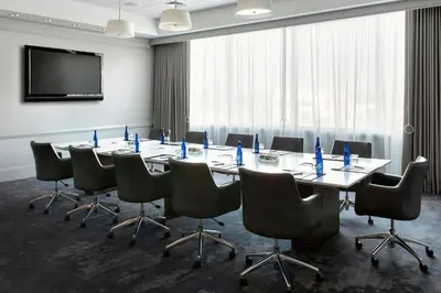 a conference room with a long table and chairs at Philadelphia Airport Marriott in Philadelphia