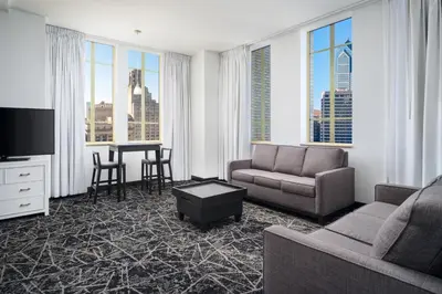 a living room with a couch and a table at Residence Inn by Marriott Philadelphia Center City in Philadelphia