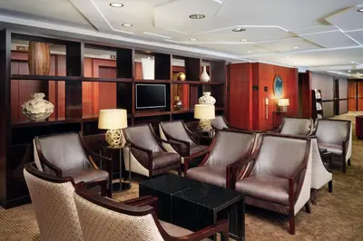 a waiting room with chairs and a flat screen tv at Residence Inn by Marriott Philadelphia Center City in Philadelphia
