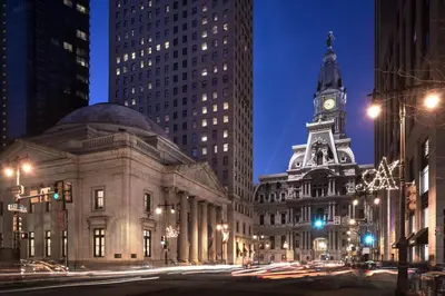 a city at night with a clock tower at The Ritz-Carlton, Philadelphia in Philadelphia