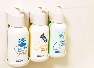 four bottles of cleaning products on a shelf at Sonesta Select Whippany Hanover in Whippany