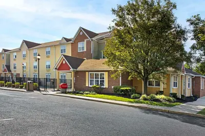 a row of houses on a city street at MainStay Suites Mt Laurel - Philadelphia in Mount Laurel