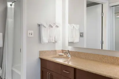 a bathroom with a sink and a mirror at Residence Inn Philadelphia Willow Grove in Horsham