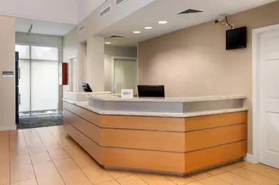 a lobby with a reception desk in a building at Residence Inn Philadelphia Willow Grove in Horsham