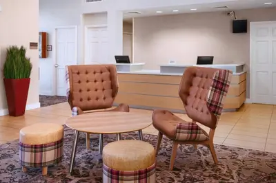a waiting room with two chairs and a table at Residence Inn Philadelphia Willow Grove in Horsham