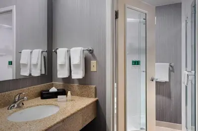 a bathroom with a sink and a shower at Courtyard Philadelphia Willow Grove in Willow Grove