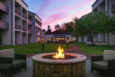 a fire pit in the courtyard of a hotel at Courtyard Philadelphia Willow Grove in Willow Grove
