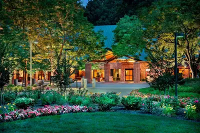 a garden with flowers in front of a building at Princeton Marriott at Forrestal in Princeton