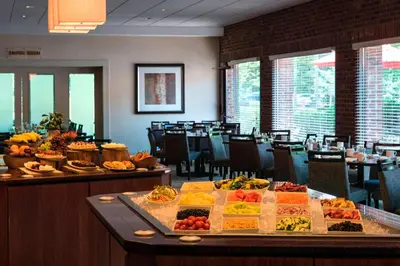 a buffet of food on a table in a restaurant at Princeton Marriott at Forrestal in Princeton