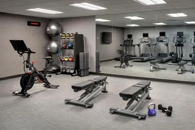 a gym with several treadmills and exercise machines at Courtyard Philadelphia Plymouth Meeting in Plymouth Meeting