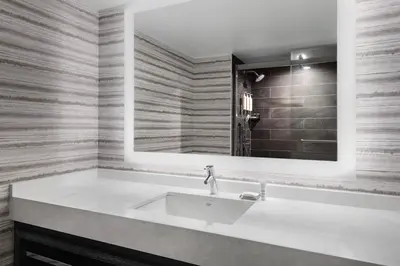 a bathroom with a sink and a mirror at Bridgewater Marriott in Bridgewater