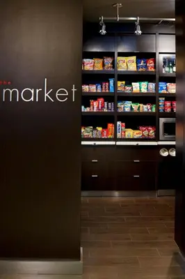 a supermarket with a pantry with food on the shelves at Courtyard by Marriott Lebanon in Lebanon