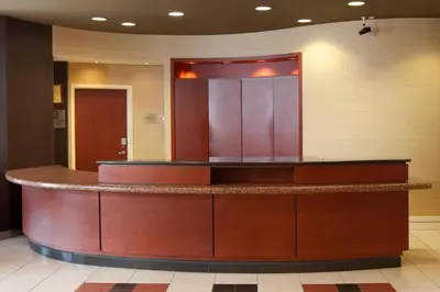 a lobby with a reception counter in a hospital at Courtyard by Marriott Lebanon in Lebanon