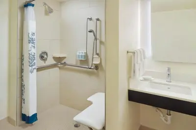 a bathroom with a sink and a toilet at Residence Inn Cranbury South Brunswick in Cranbury