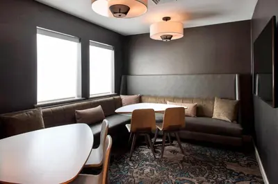 a dining room with a table and chairs and a window at Residence Inn Philadelphia Valley Forge in Berwyn